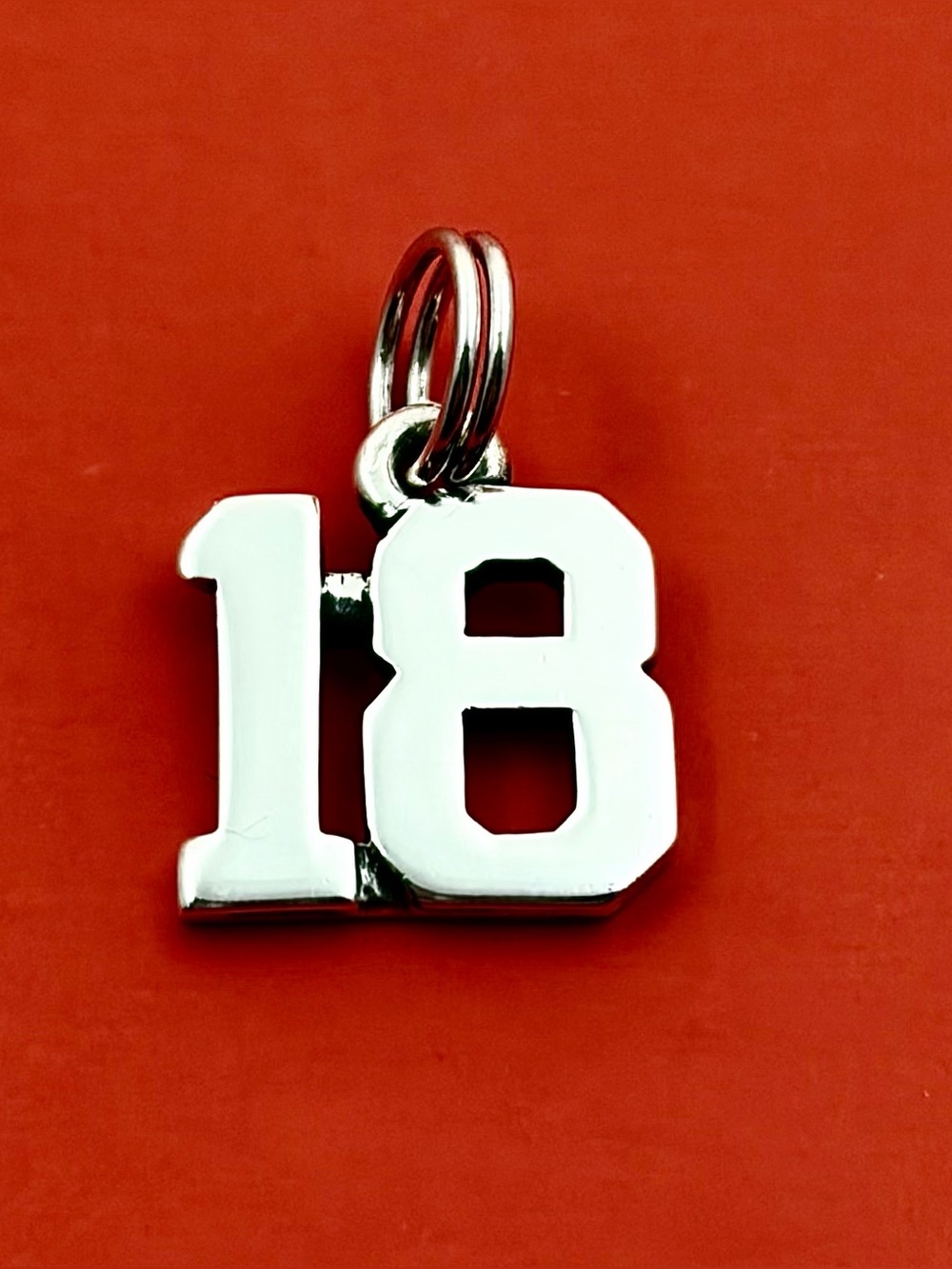 James Avery Silver '18' Number Charm with Red Backdrop
